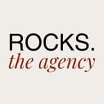 ROCKS. THE AGENCY logo