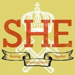 SHE IS THE VOICE logo