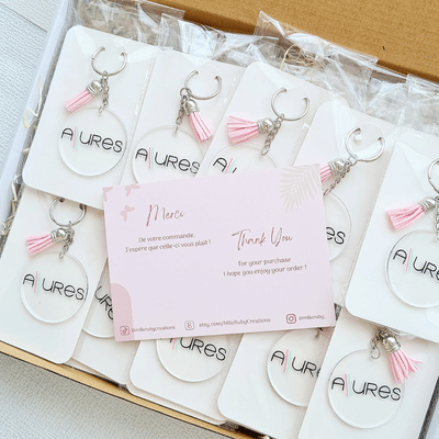 Porte-clés personnalisés a la main pour une agence de relooking - Evénementiel