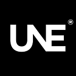 UNE® logo