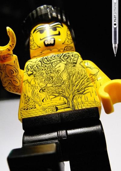 Legoman tattoo, chest - Publicidad