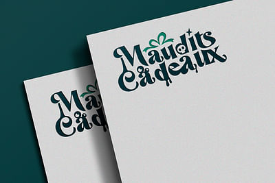 Création de l'identité marque Maudits Cadeaux - Creazione di siti web