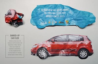 Banged-up car flier - Advertising