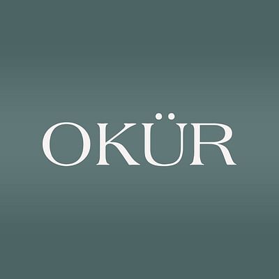 Okür - Rédaction et traduction